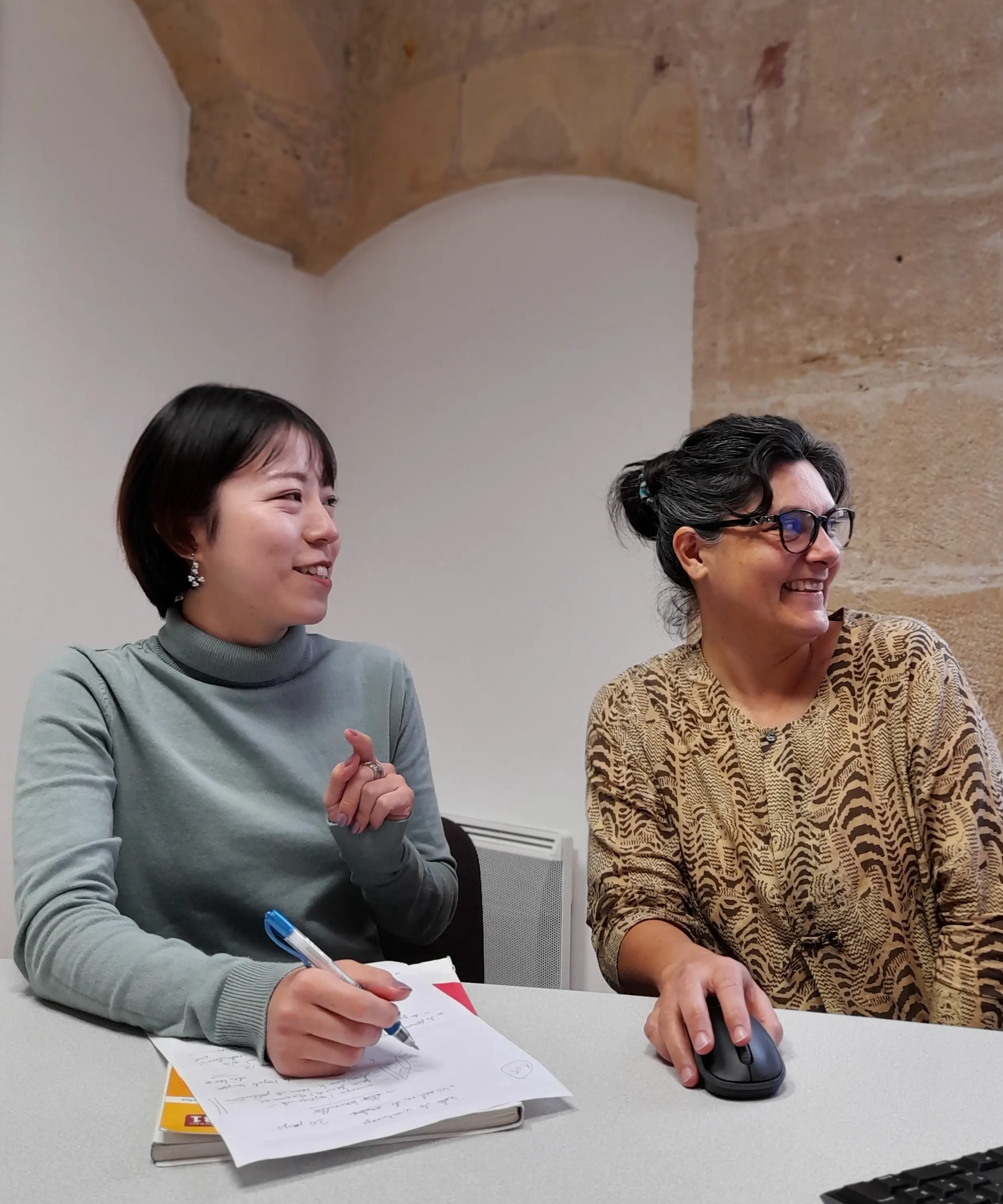 Anila with a student