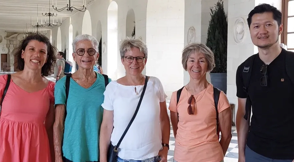 Céline with 4 students on a tour of Chenonceau