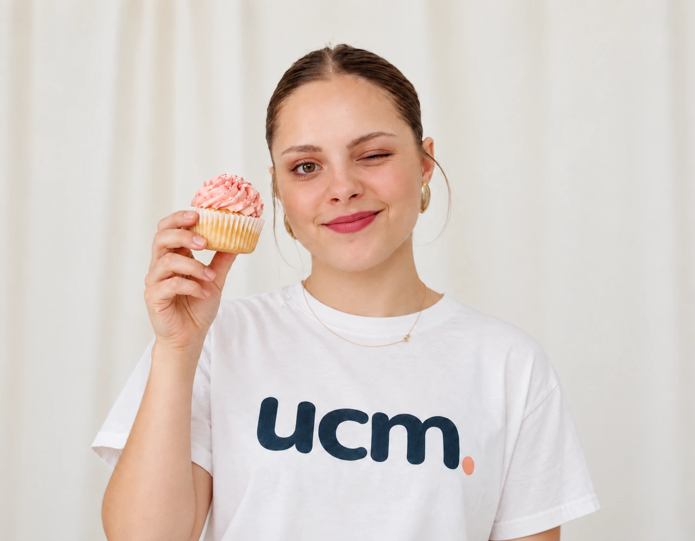 Ein Cupcake zwinkert