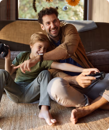 Father and son playing together on the floor