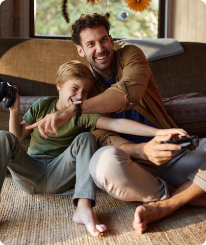 Father and son playing together on the floor