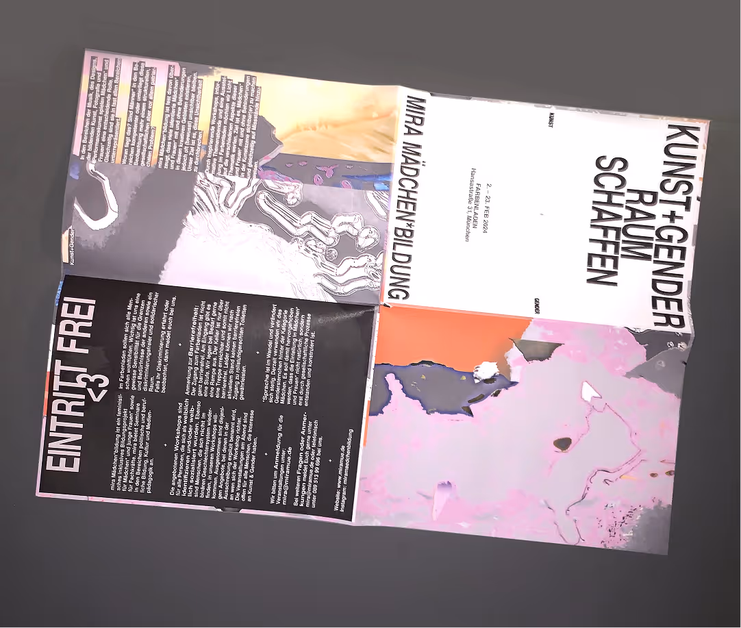 Brochure opened flat with sections of text and abstract pink, orange, and gray artwork, including titles art and gender