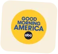 "Good Morning America" logo with ABC network symbol below it inside a yellow circle on a beige background.