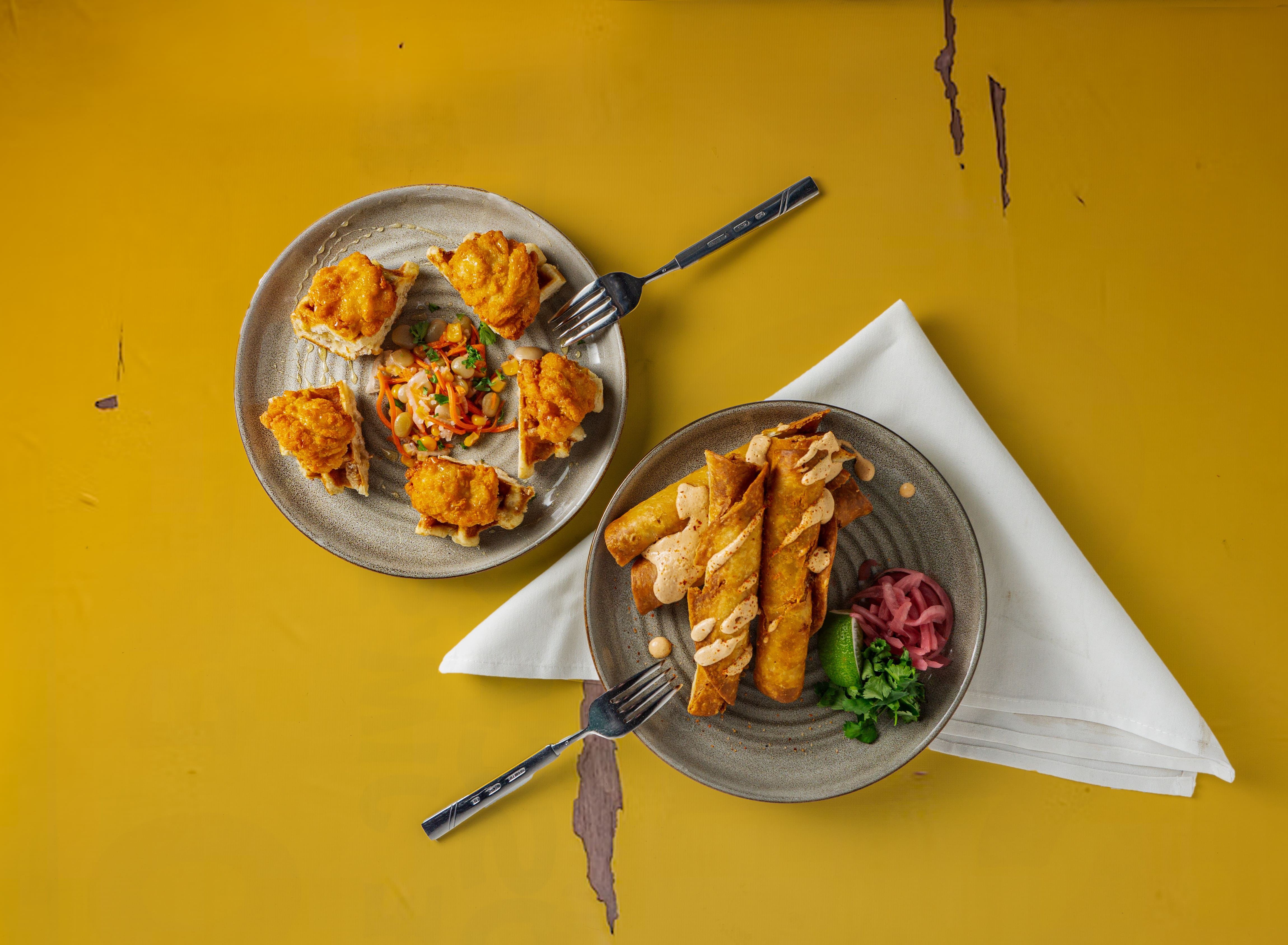 Overhead view of plated dishes for a social gathering