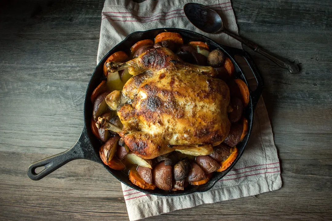 Roast chicken with potatoes and vegetables