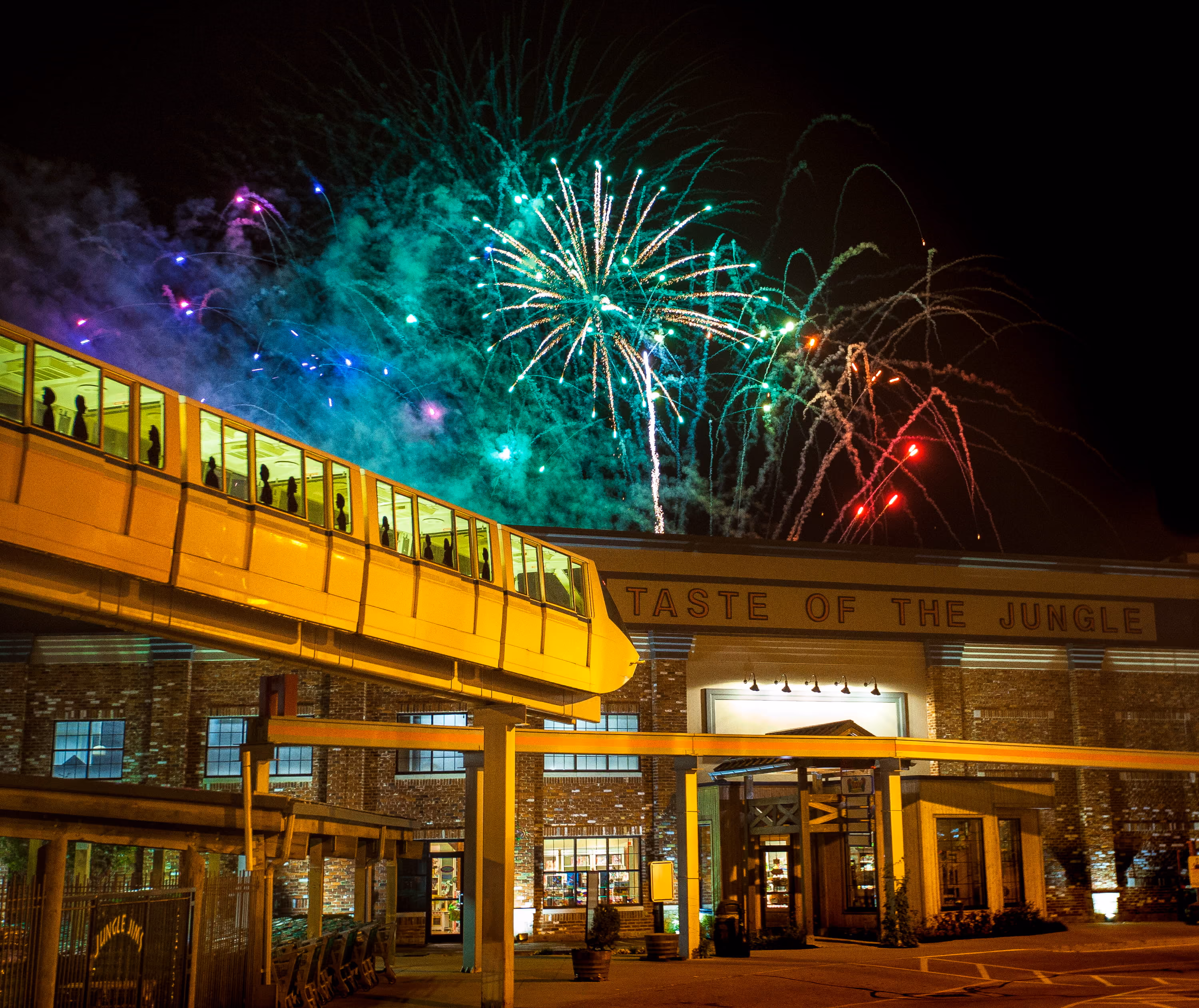 Jungle Jim's storefront illuminated at night