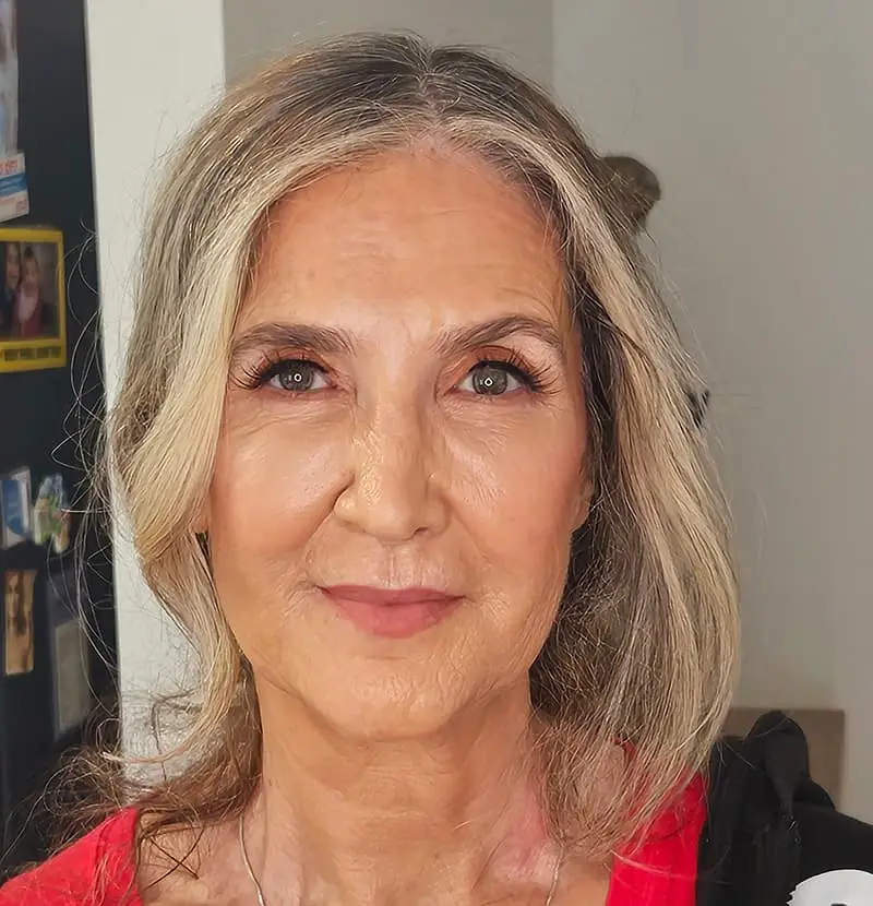 Mature woman with elegant natural makeup and soft lashes