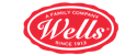Wells brand logo in red with cursive font inside an oval shape.