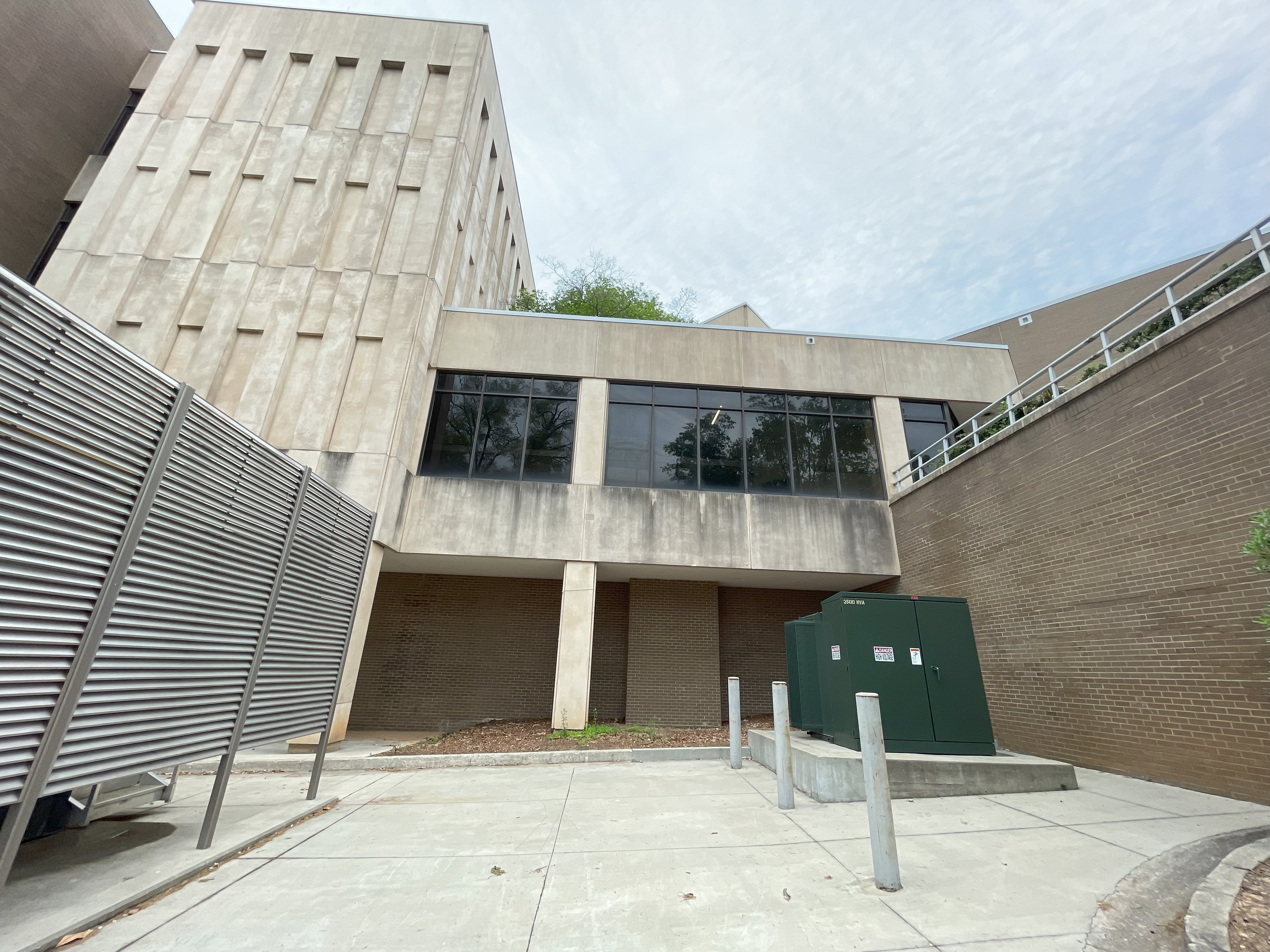 Black streaks on exterior of building prior to cleaning