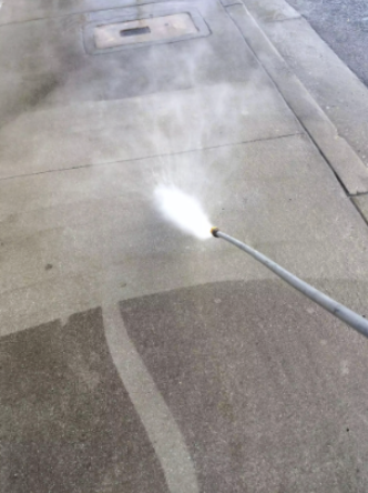 Sidewalk power washing