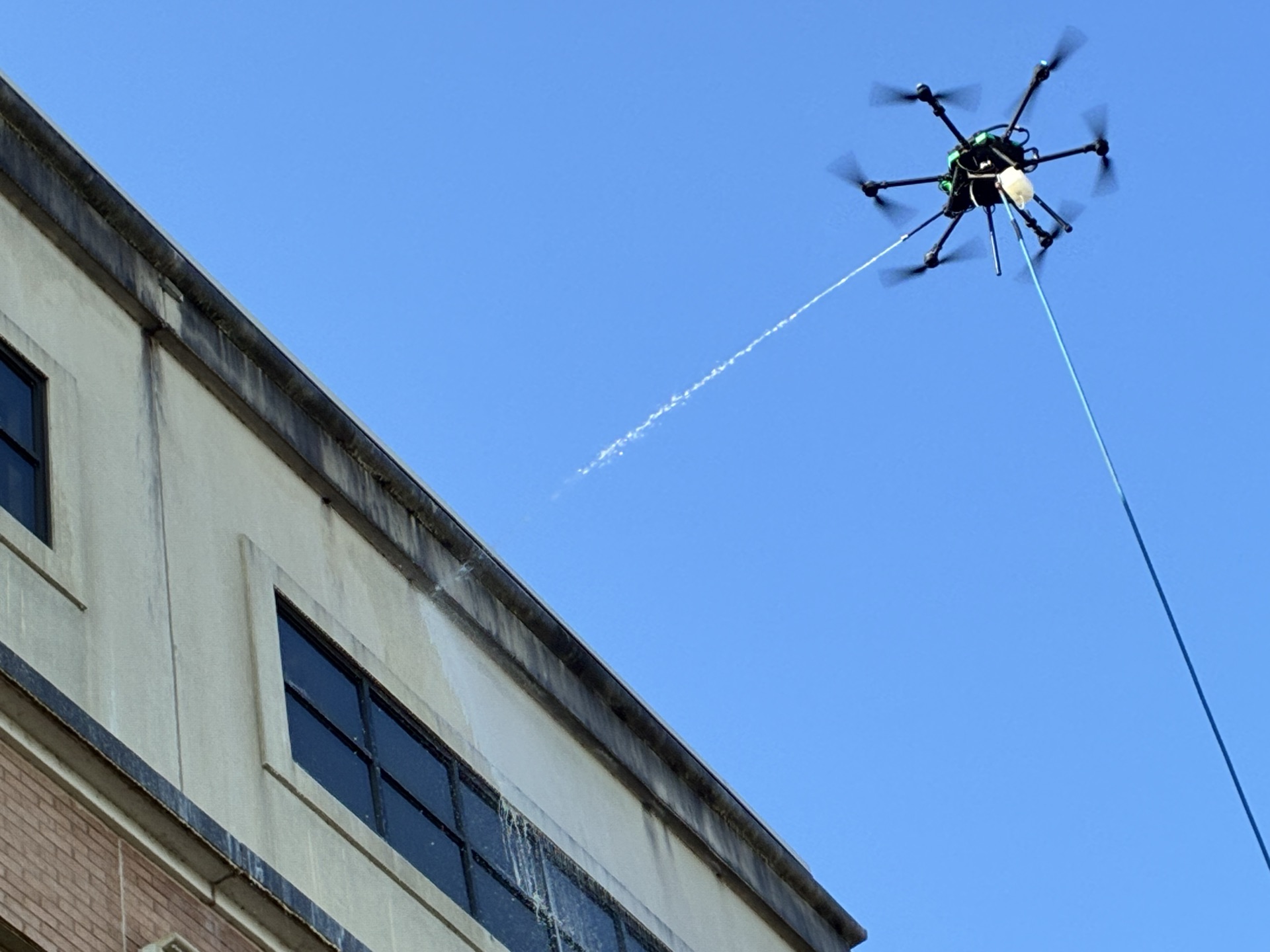 Drone cleaning exterior windows
