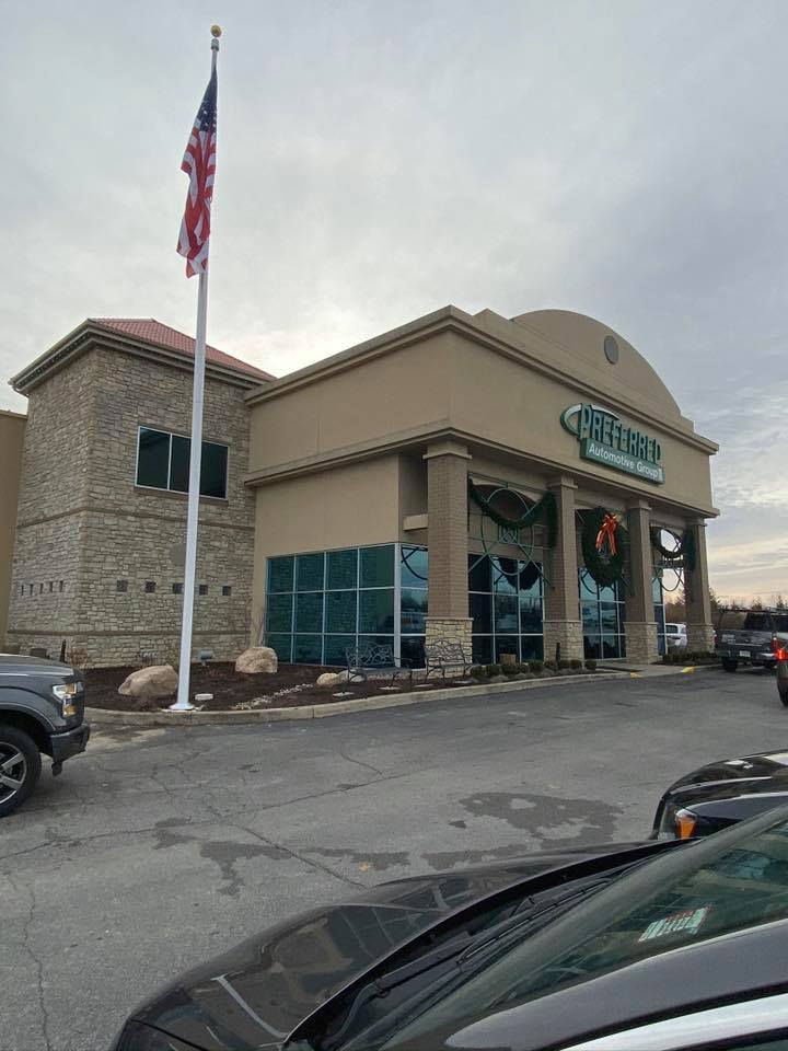 Commercial flagpole installation by Knot Just Decks