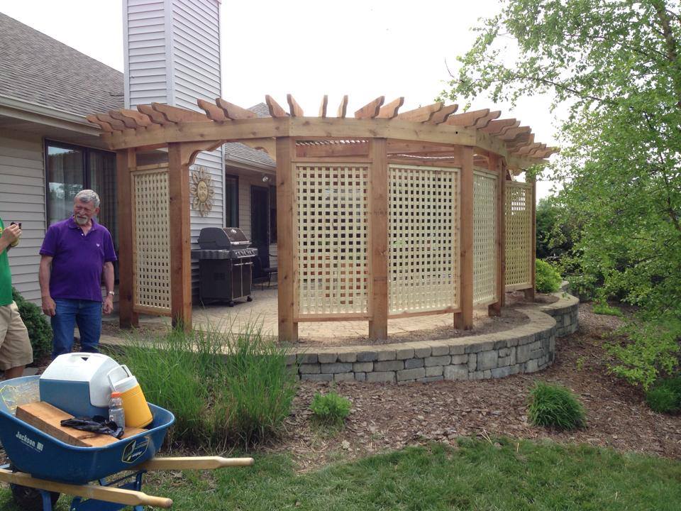 Cedar pergola privacy lattice on wood deck by Knot Just Decks