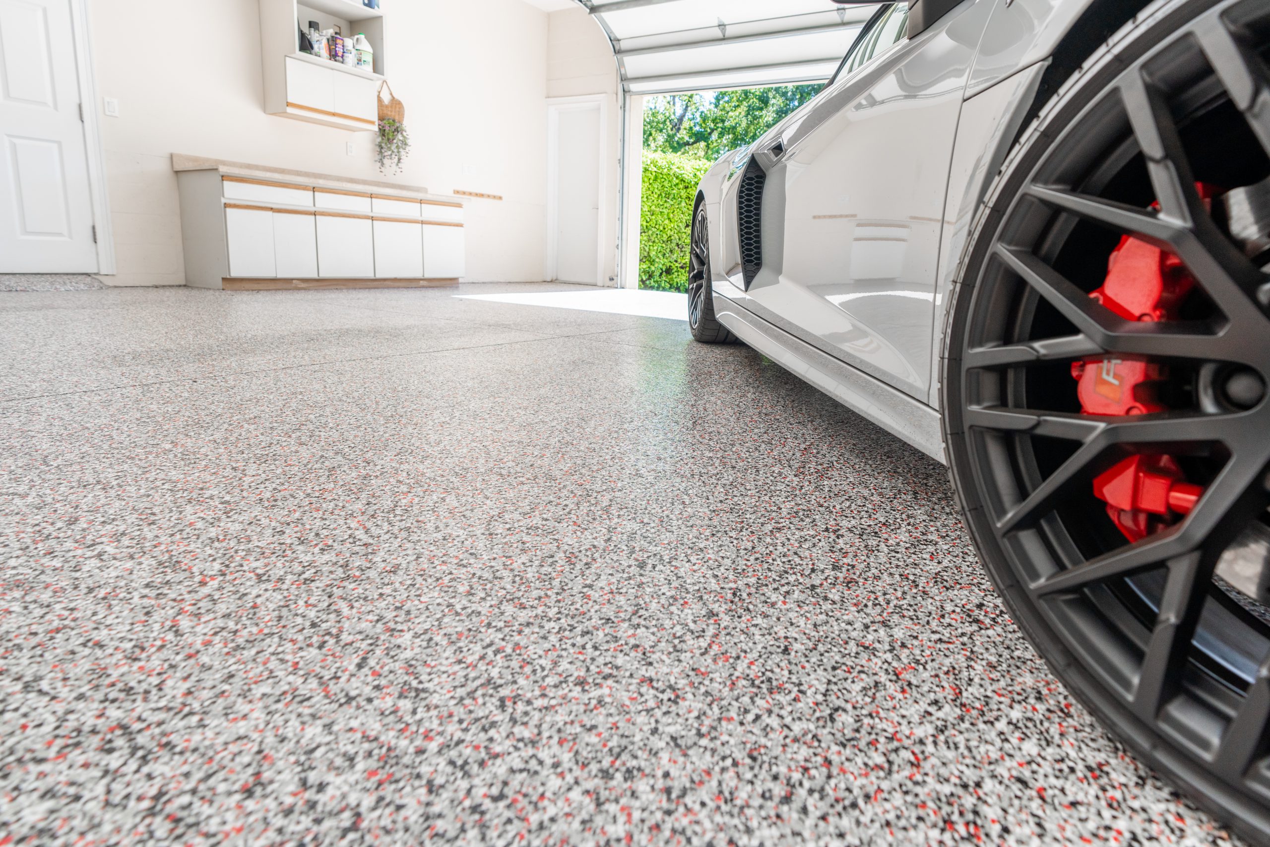 Polyurea garage floor coating installed by Knot Just Decks Fort Wayne