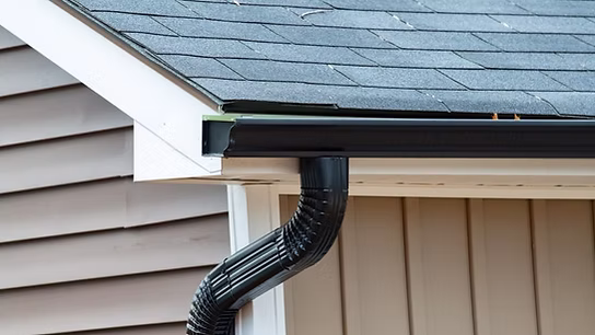 Seamless aluminum gutter installation by Knot Just Decks Fort Wayne