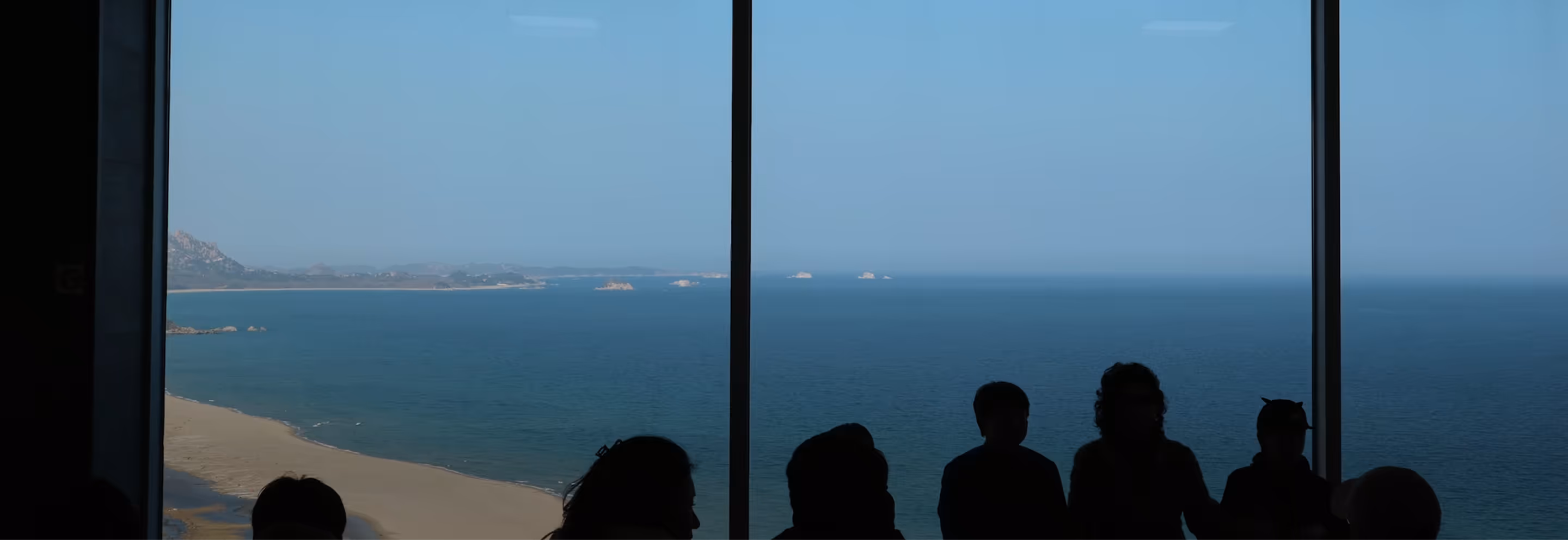 Got it. From now on I’ll only provide the alt tag. For the last image: Business team meeting in a conference room overlooking the ocean.