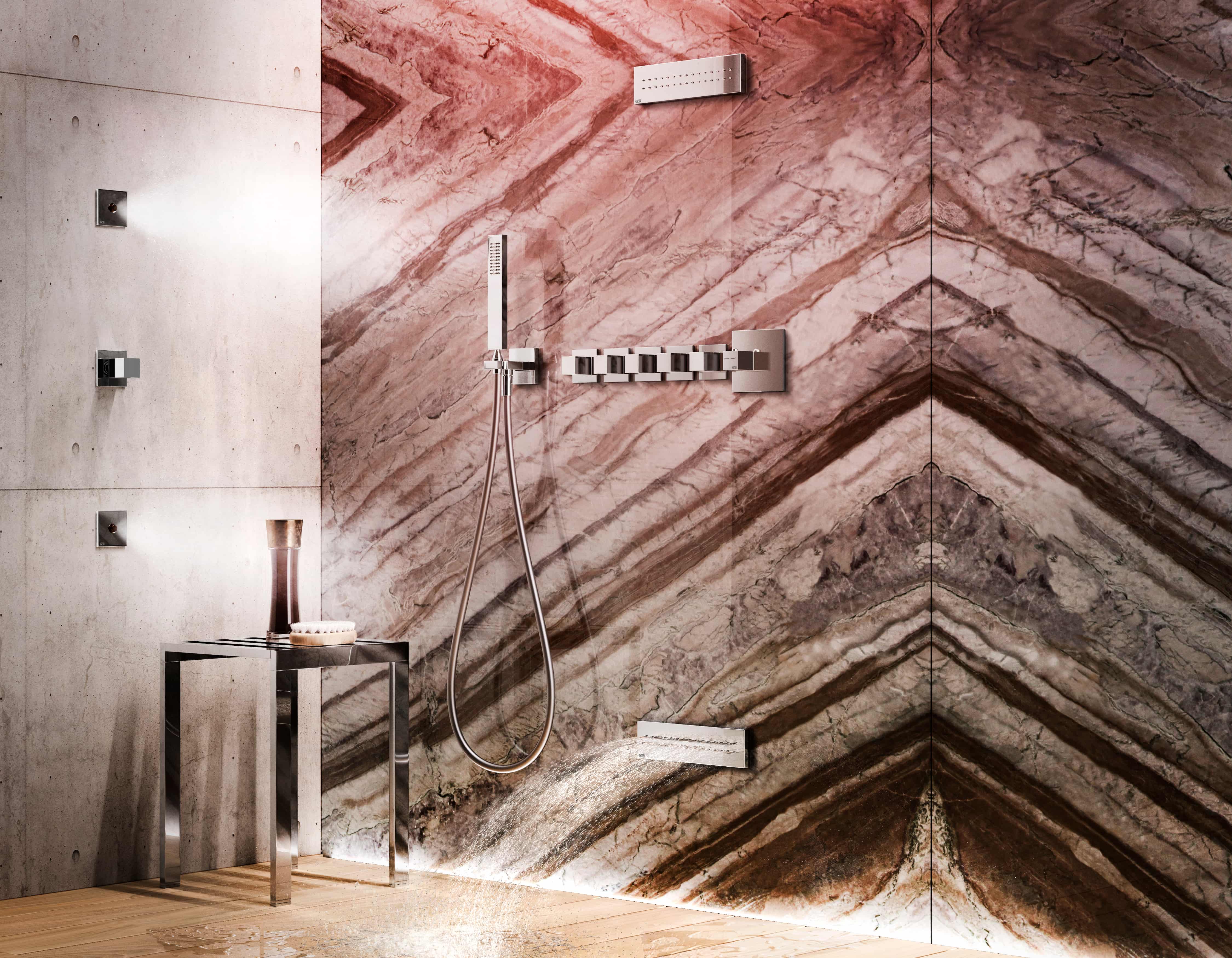 Gessi Afilo douchesysteem in chroom tegen marmeren wand met natuurpatroon