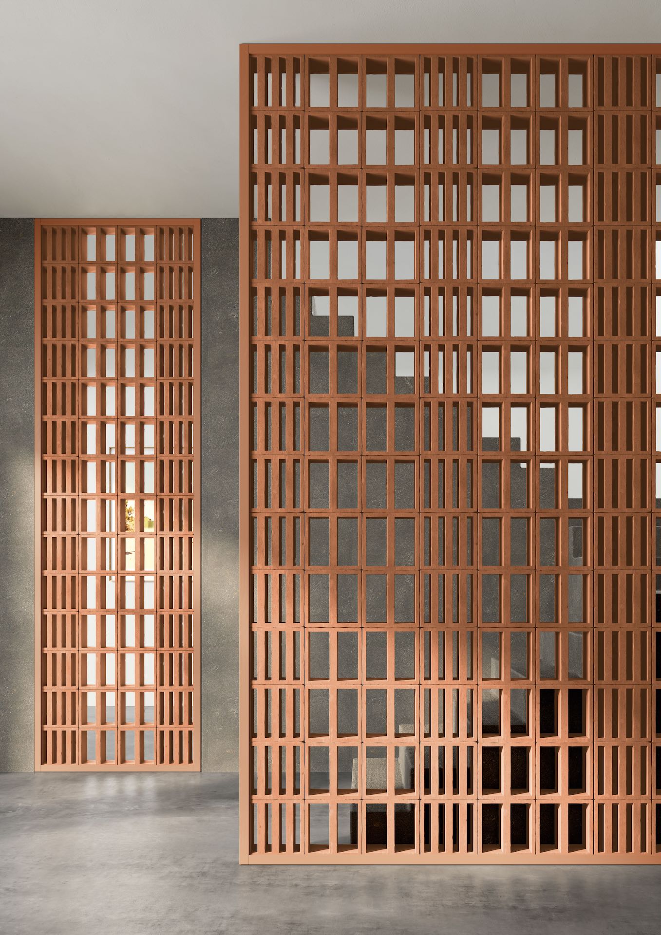 Mutina terracotta latwerk als roomverdeler met warme verlichting