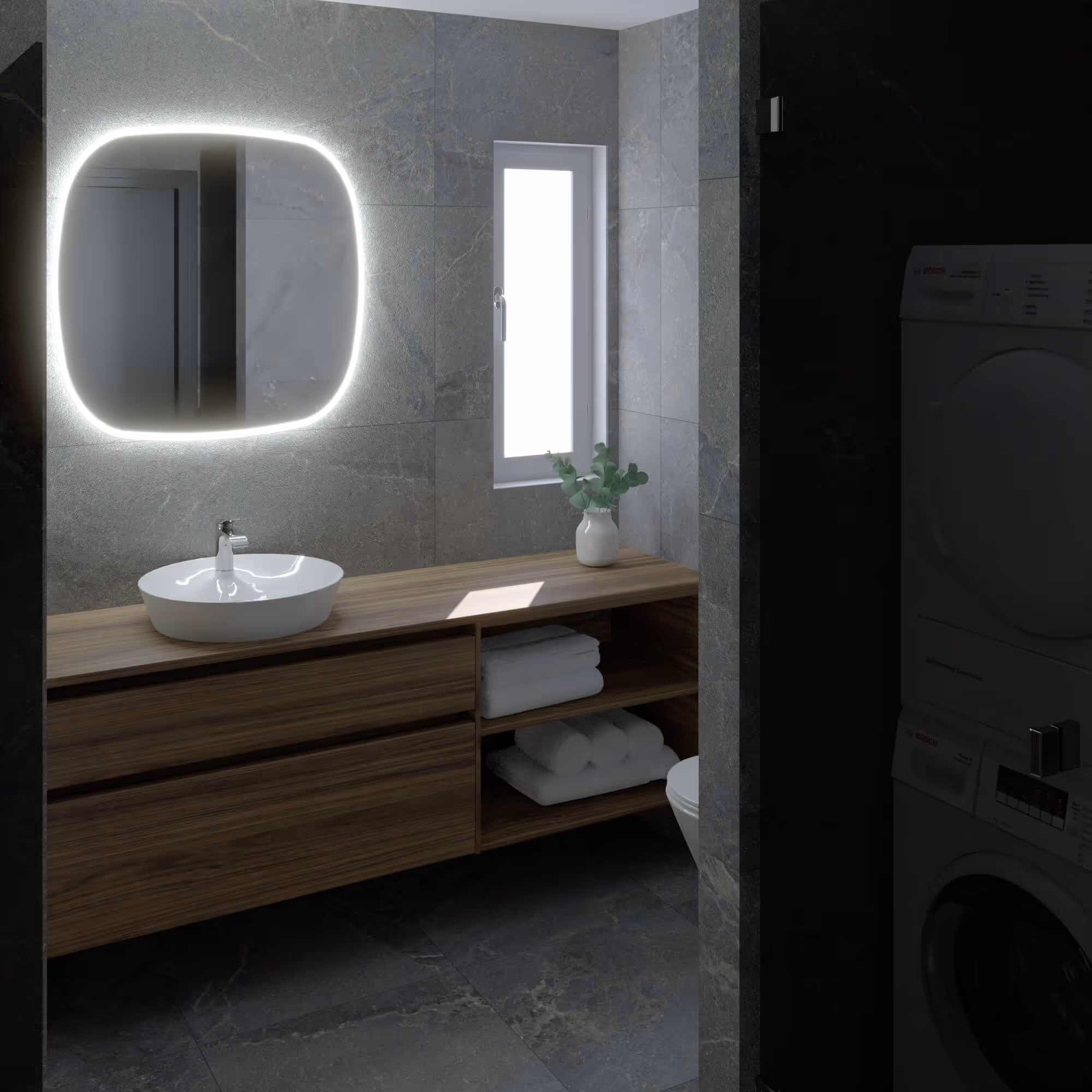 Urban Chique badkamer in Alkmaar met houten wastafelmeubel, ronde spiegel en wasmachine op de achtergrond