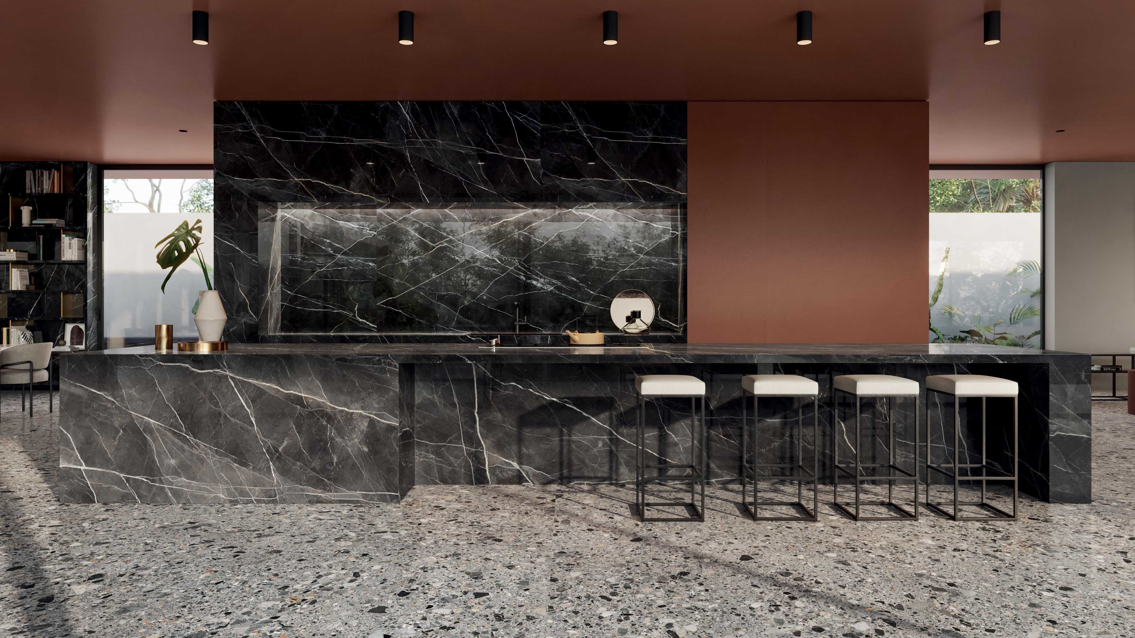 Porcelanosa Ceppo Stone terrazzo-look tegelvloer in keuken met zwart marmerlook keukeneiland