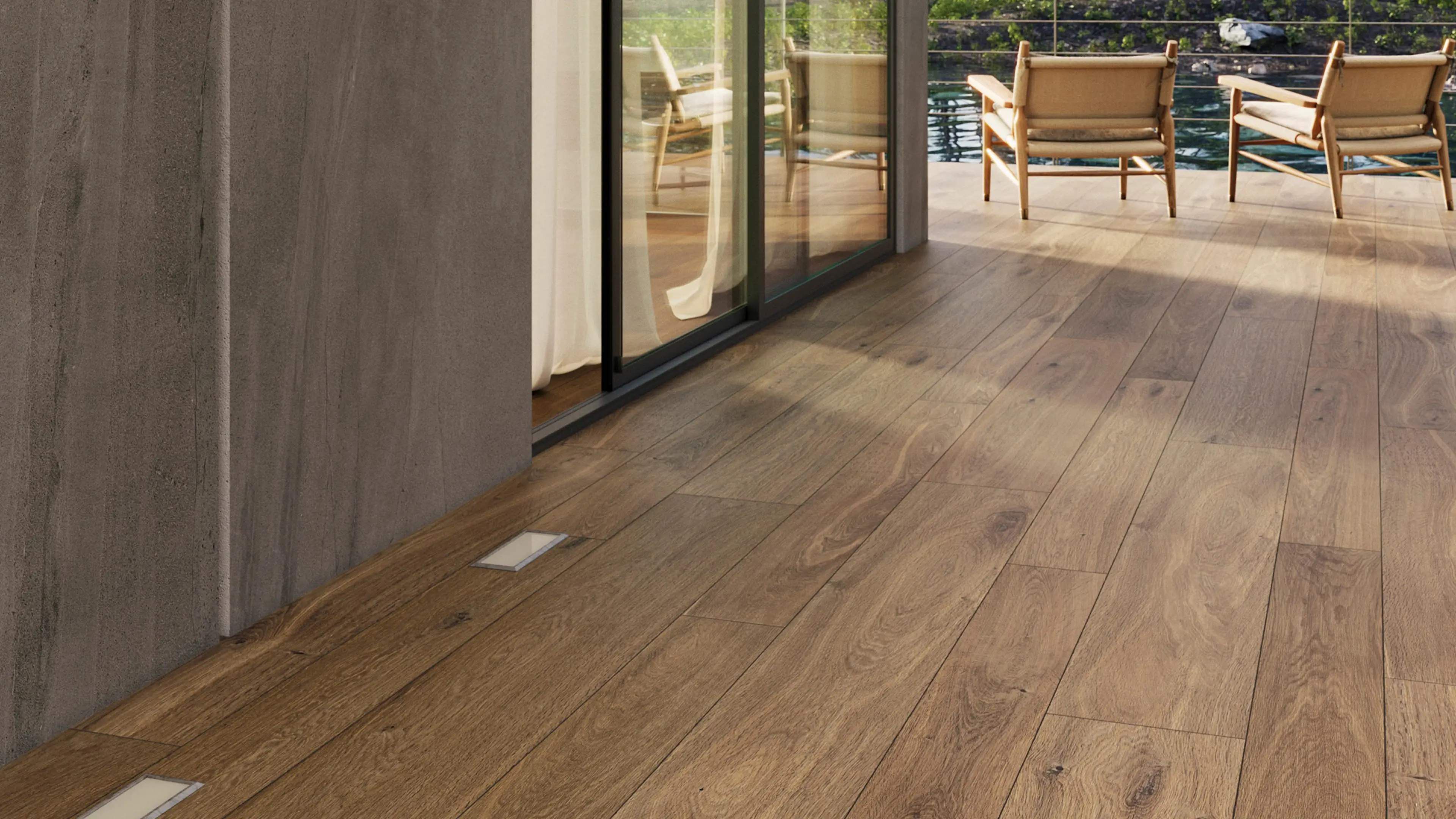 Porcelanosa Gent Roble houtlook tegel op een terras met rieten stoelen en waterzicht