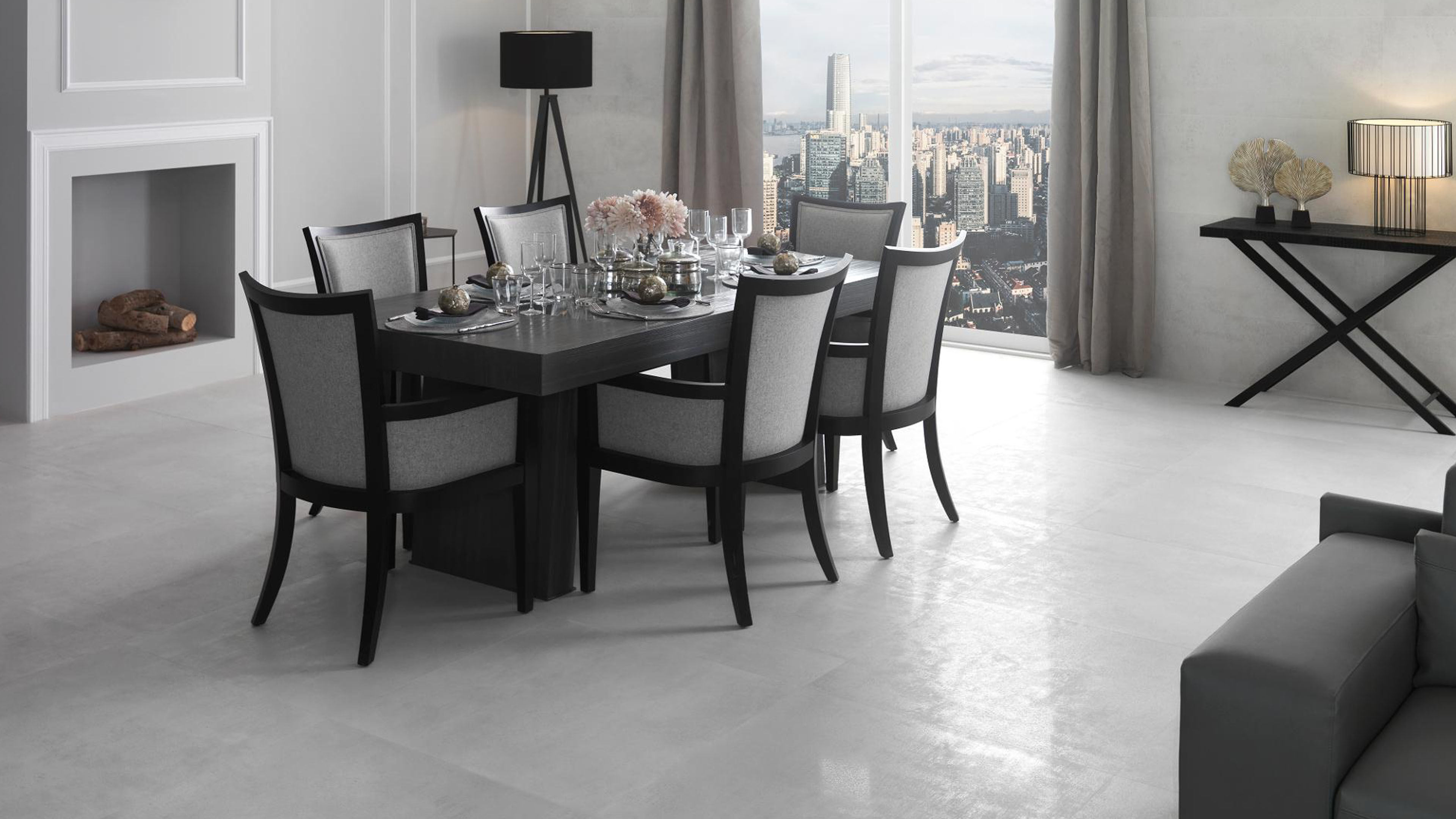 Eetkamer met Porcelanosa Metropolitan Nature Caliza vloertegel en raam met stadszicht