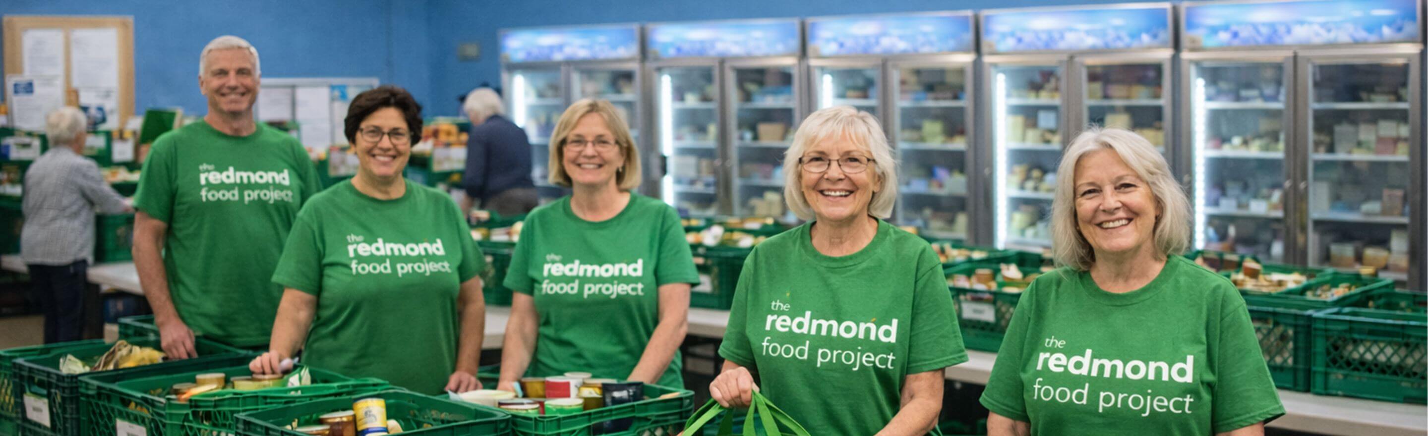 A group of volunteers for The Redmond Food Project sorting food at St Vincent de Paul.
