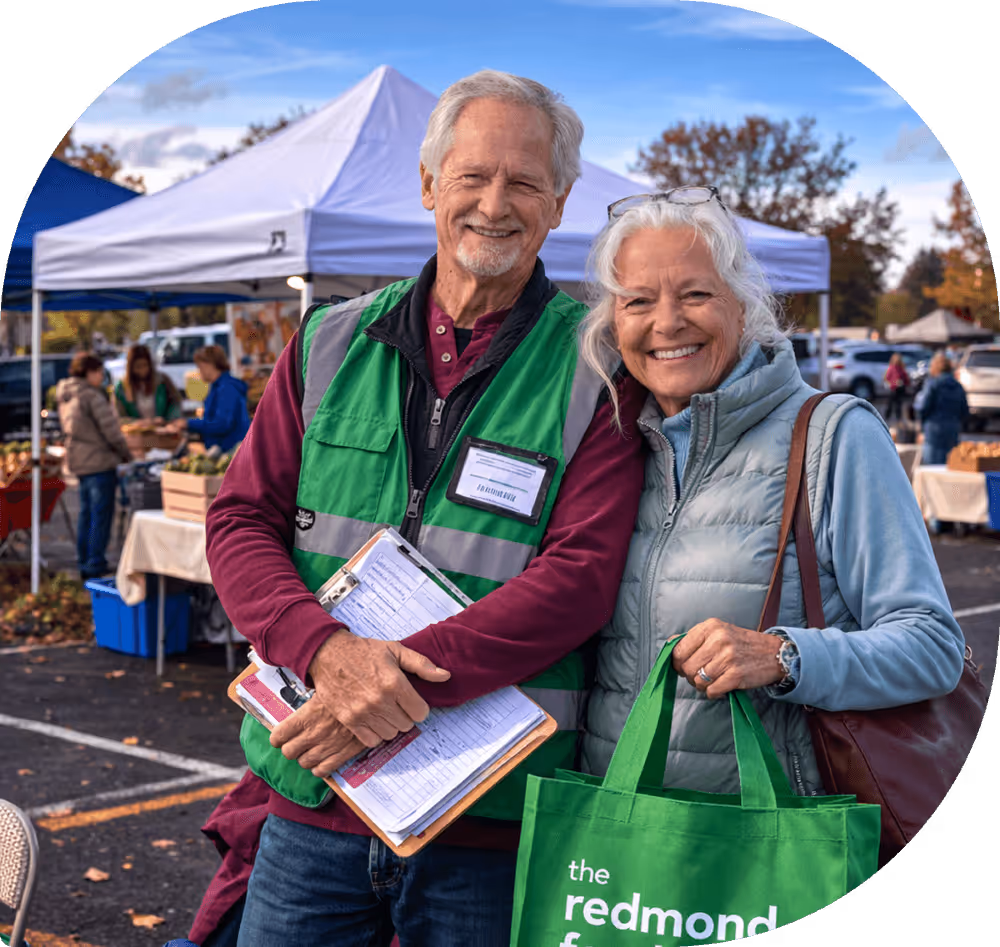 Two volunteers at the food bank distribution point