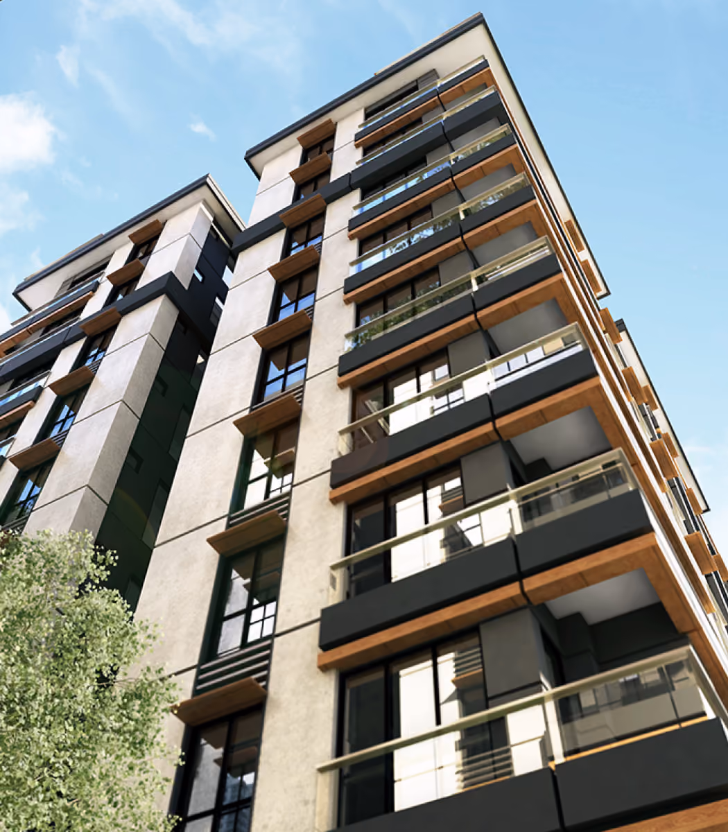 Modern apartment building with large windows, balconies, and wooden accents under a blue sky.