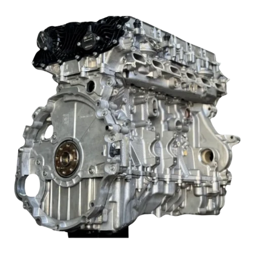 Silver Jaguar engine block with visible mounting points and circular bearing housing.