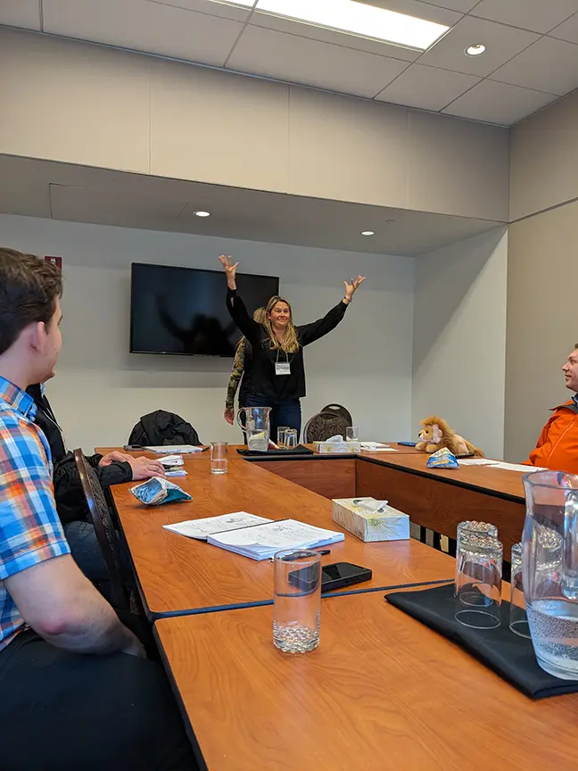 Lions group - value proposition discussion, led by Jennifer Massig and Kristy Dixon (standing back-to-back)