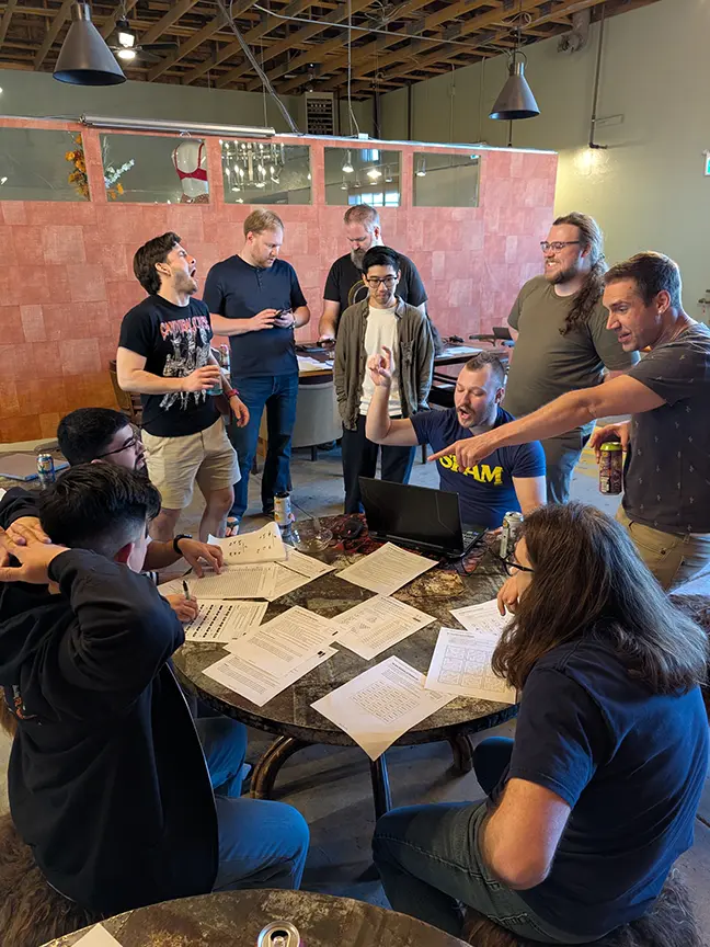 TCG Machines team members play a bomb defusing game