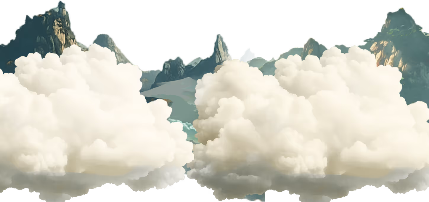 Large fluffy white clouds floating in front of rocky mountain peaks.