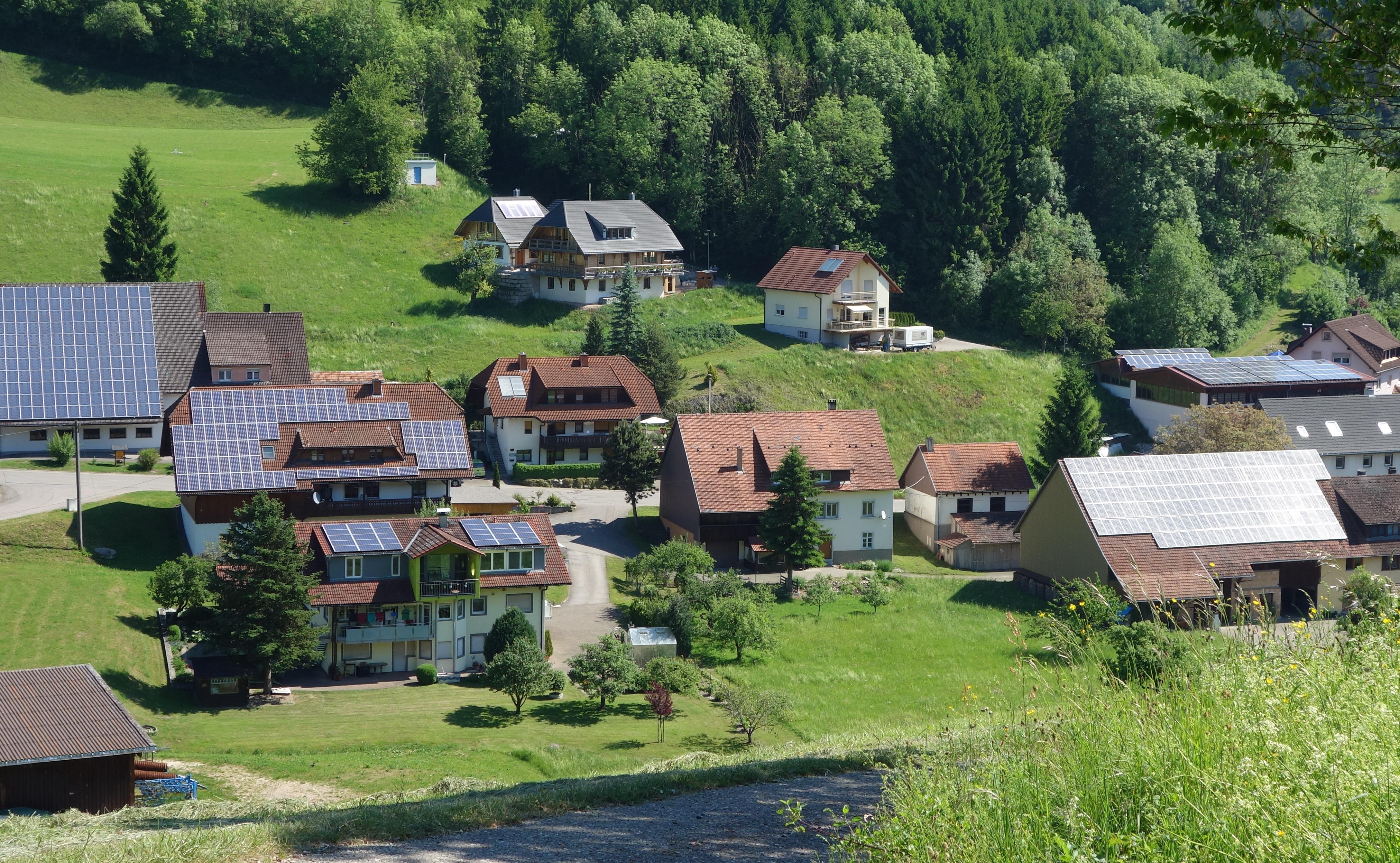 Off-grid options for rural land — solar panels and battery system on rural property