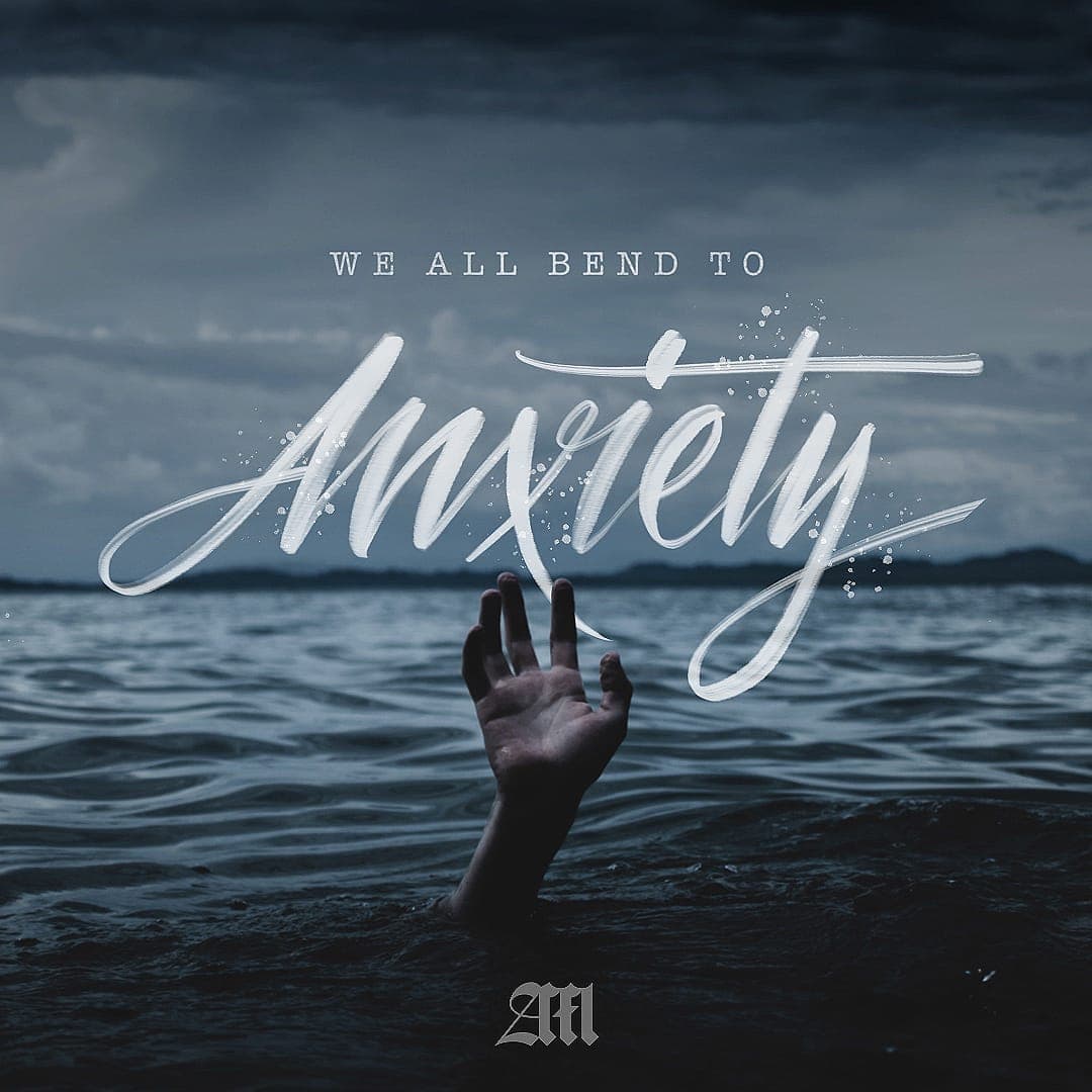 "We all bend to Anxiety" hand-lettered text over a photo of a hand reaching up from dark water.