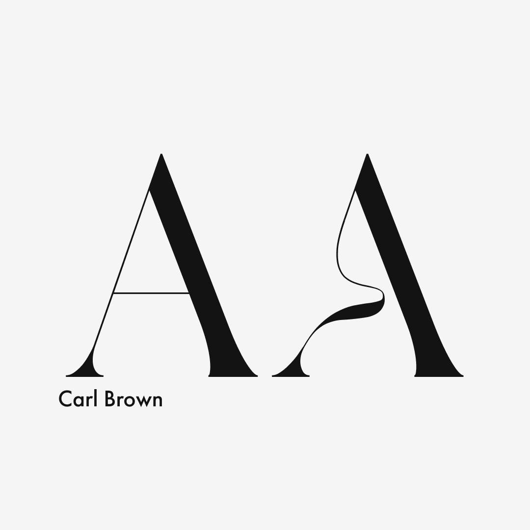 Carl Brown typeface specimen, two variant "A" glyphs in black on white showing the font's expressive serif detailing, part of VRSNL's typography system selected by Alex Mera.