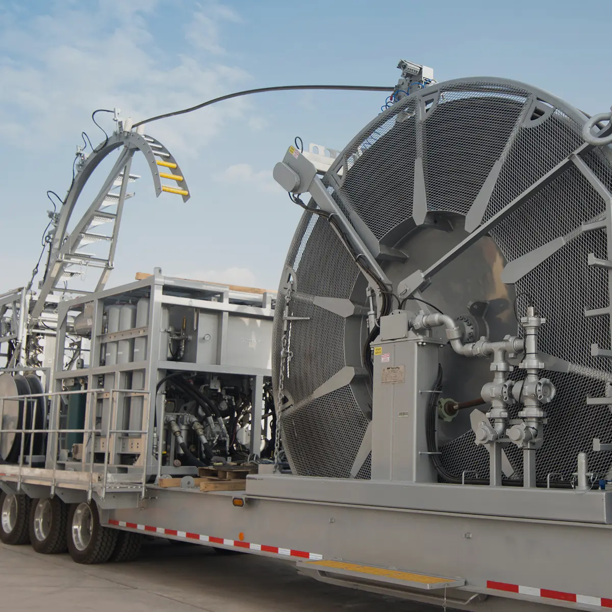 Coiled tubing unit loaded on a transport trailer
