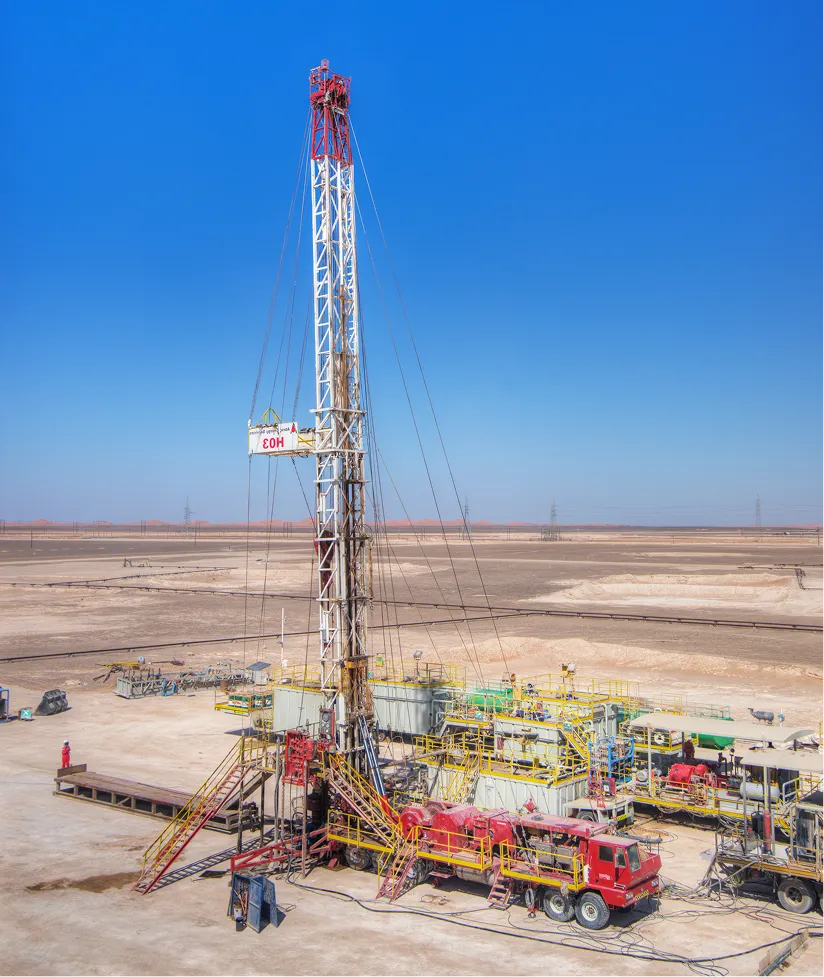 Workover rig operating on a desert wellsite