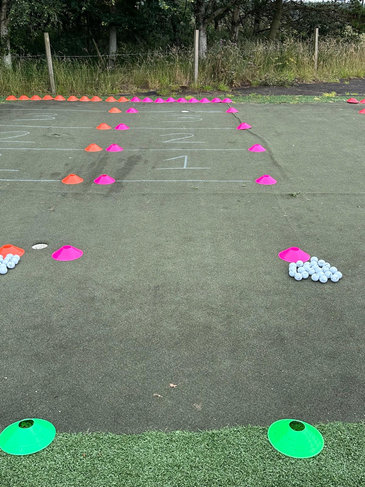 Philip McLean coaching at Berryhill Driving Range