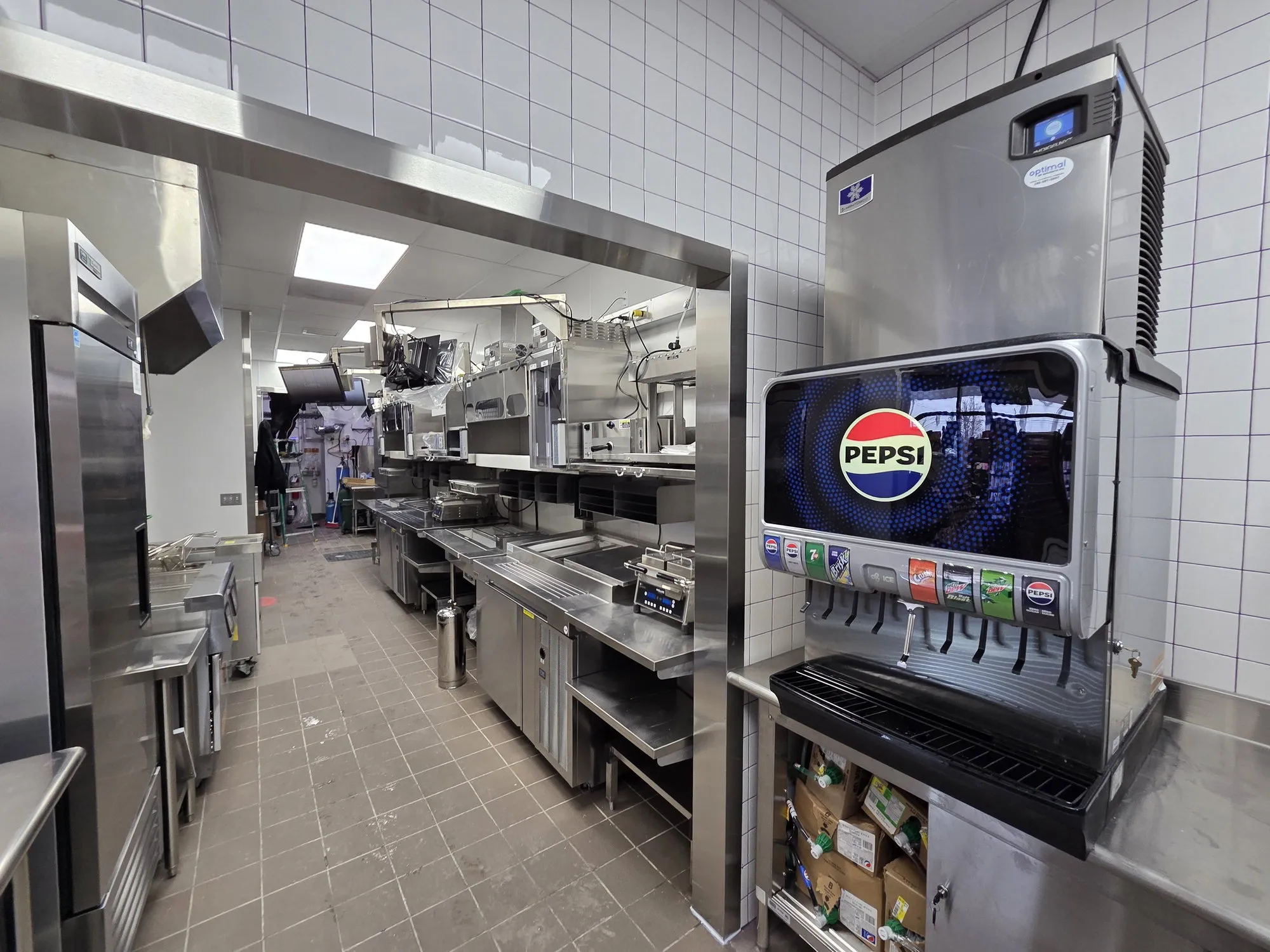 Completed quick-service kitchen line with beverage tower inside a Vaughan gas station convenience store
