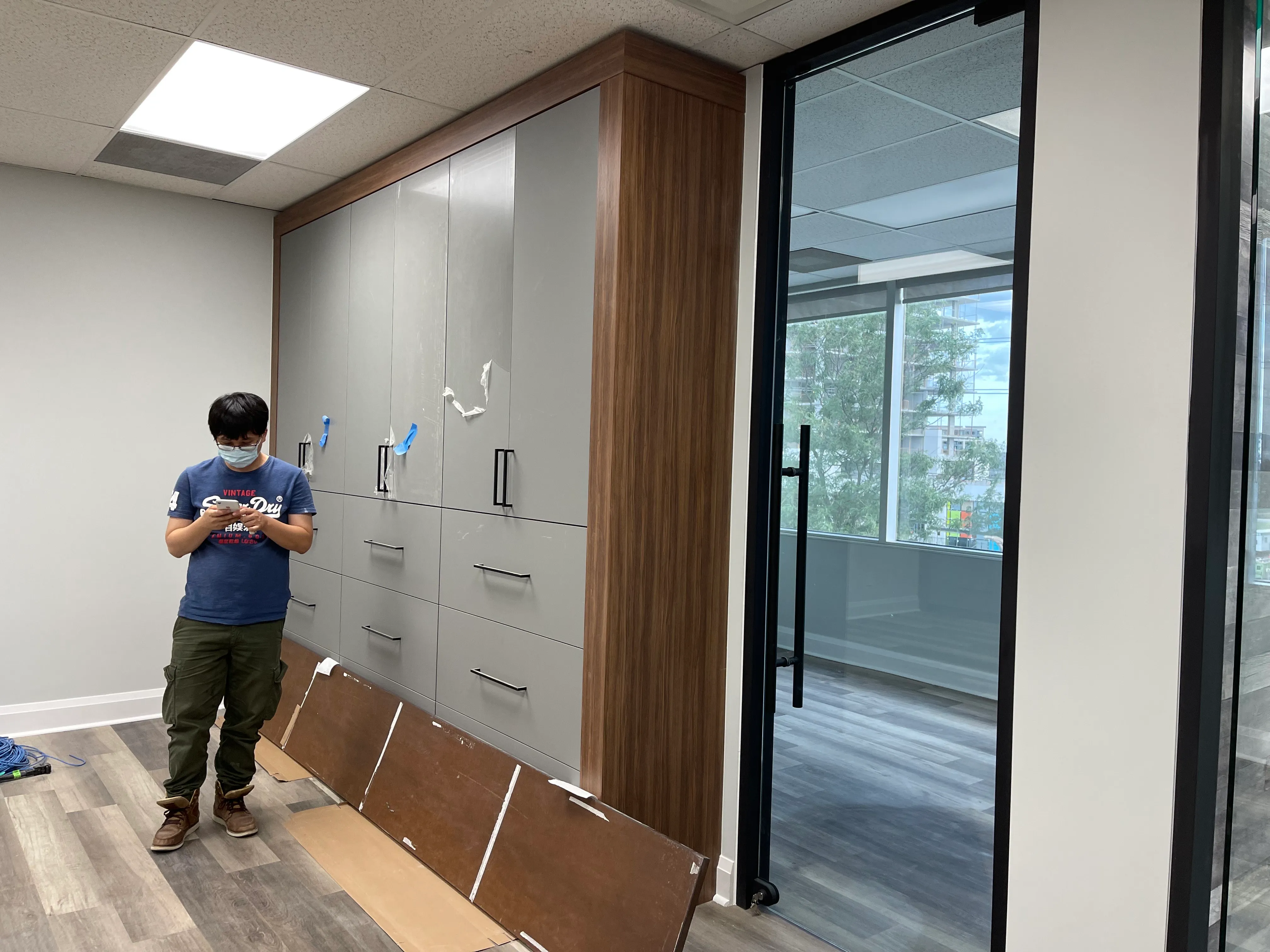 Custom office storage wall and corridor in a completed GTA tenant improvement