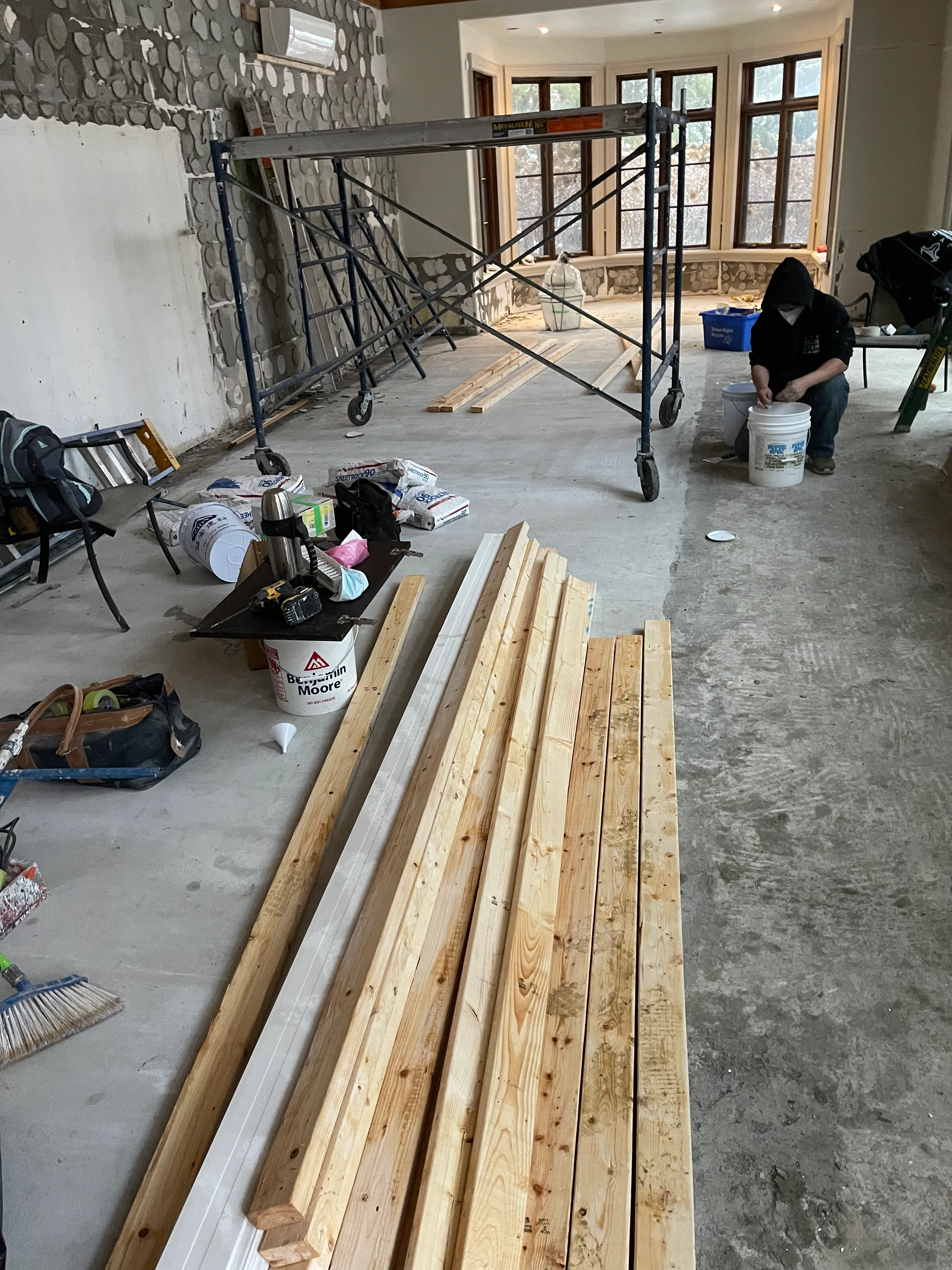 Buildup Contracting project manager coordinating work on a GTA construction site