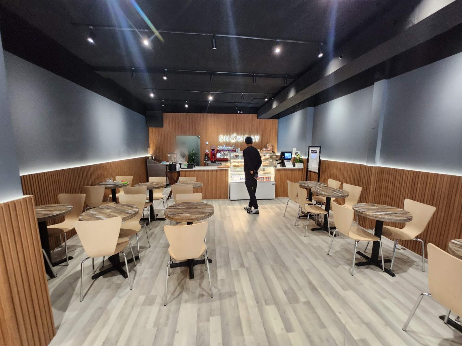 Dining room of a 500 sf Toronto dessert cafe after a six-week renovation