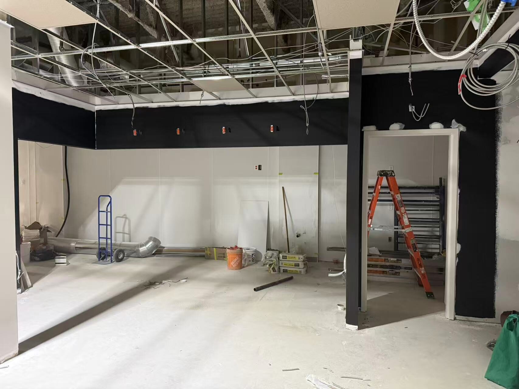 Restaurant interior after drywall, taping and paint with brand bulkheads formed