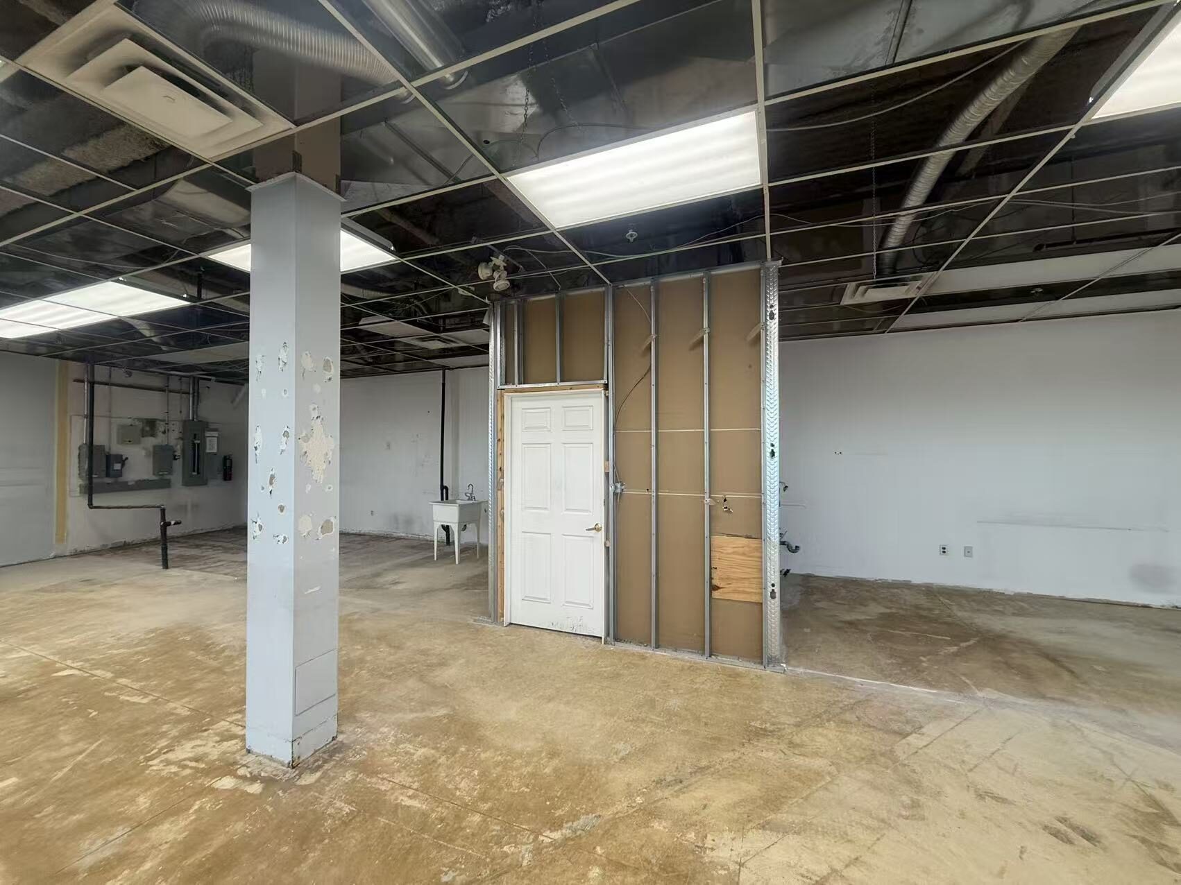 Vacant retail unit in Toronto before a quick-service restaurant build-out by Buildup Contracting