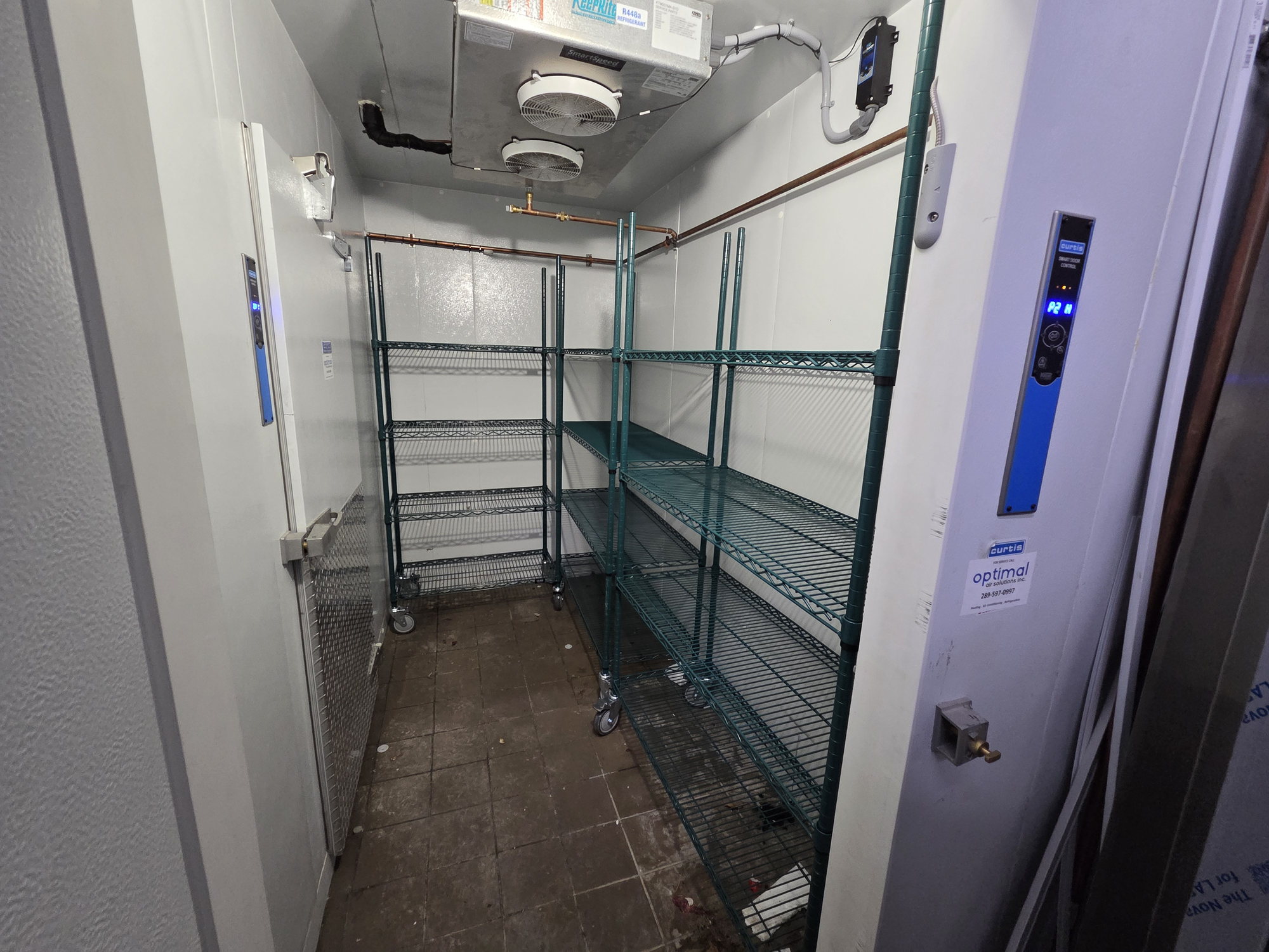 Walk-in cooler with wire shelving installed during a Vaughan gas station restaurant build-out