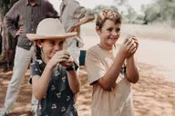 Children meeting young chicks at the reserve