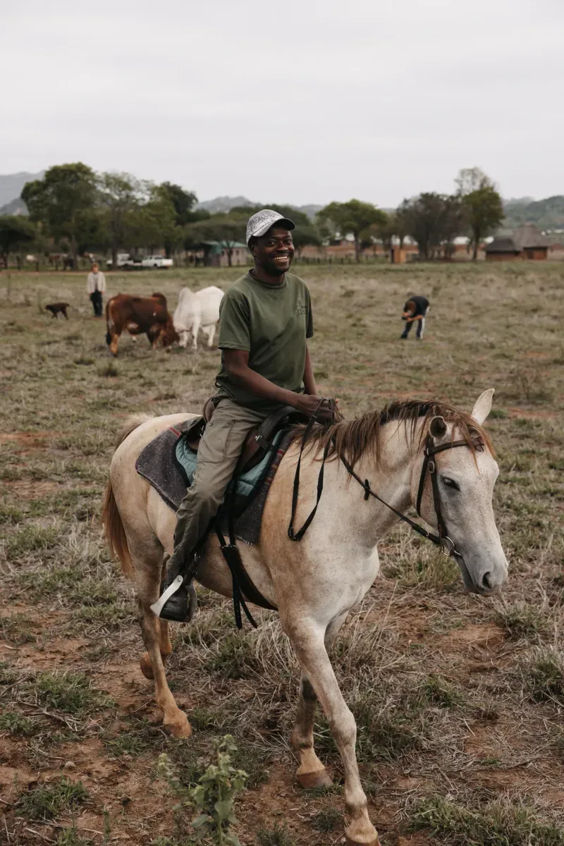 A local riding guide with his horse
