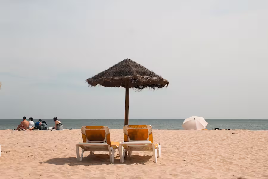 sun longers on a beach in Bali