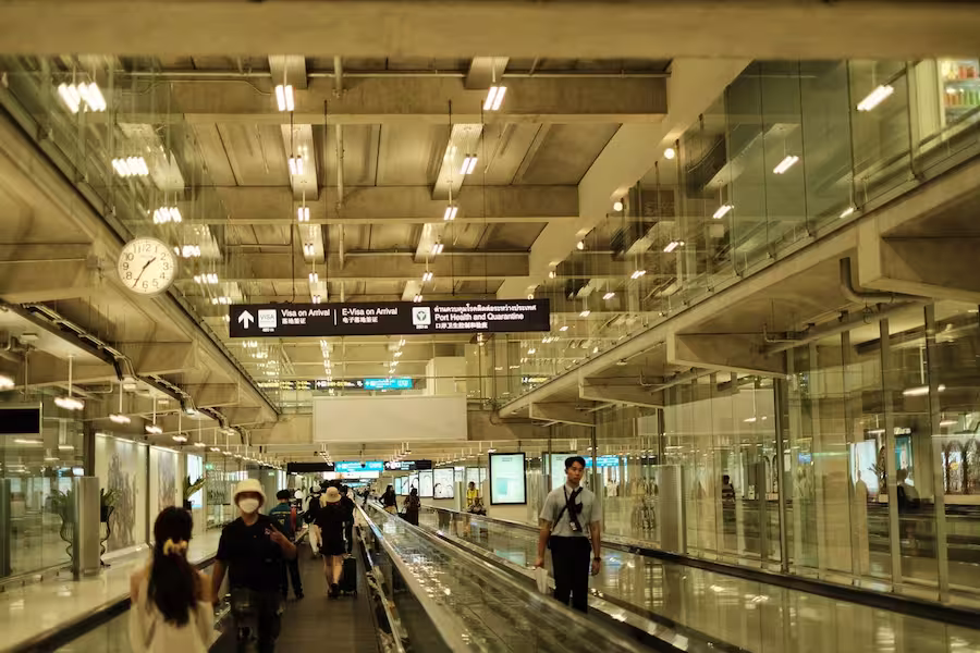 people moving inside the airport